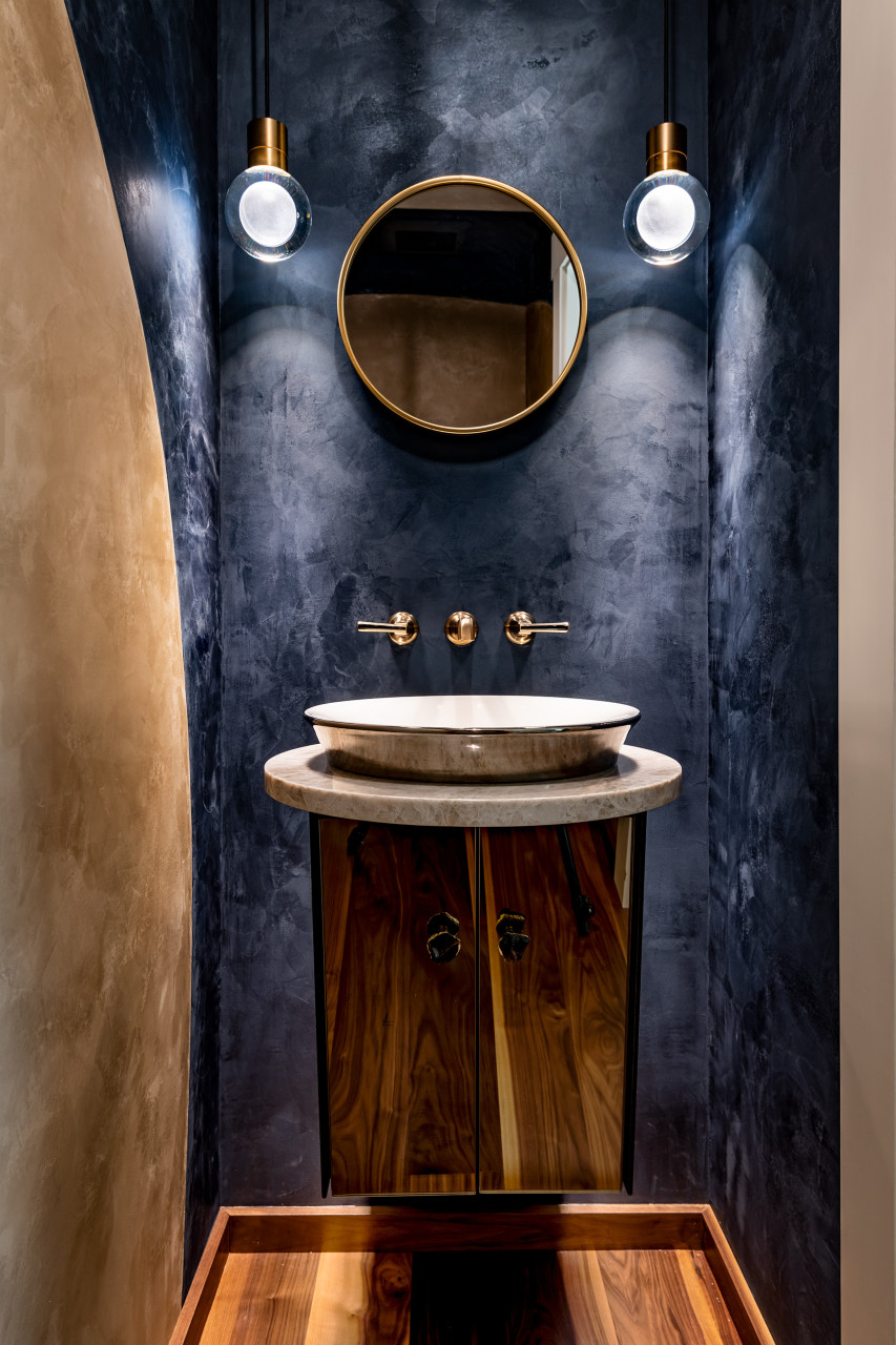 Powder room with Venetian plaster walls & RLD-designed vanity